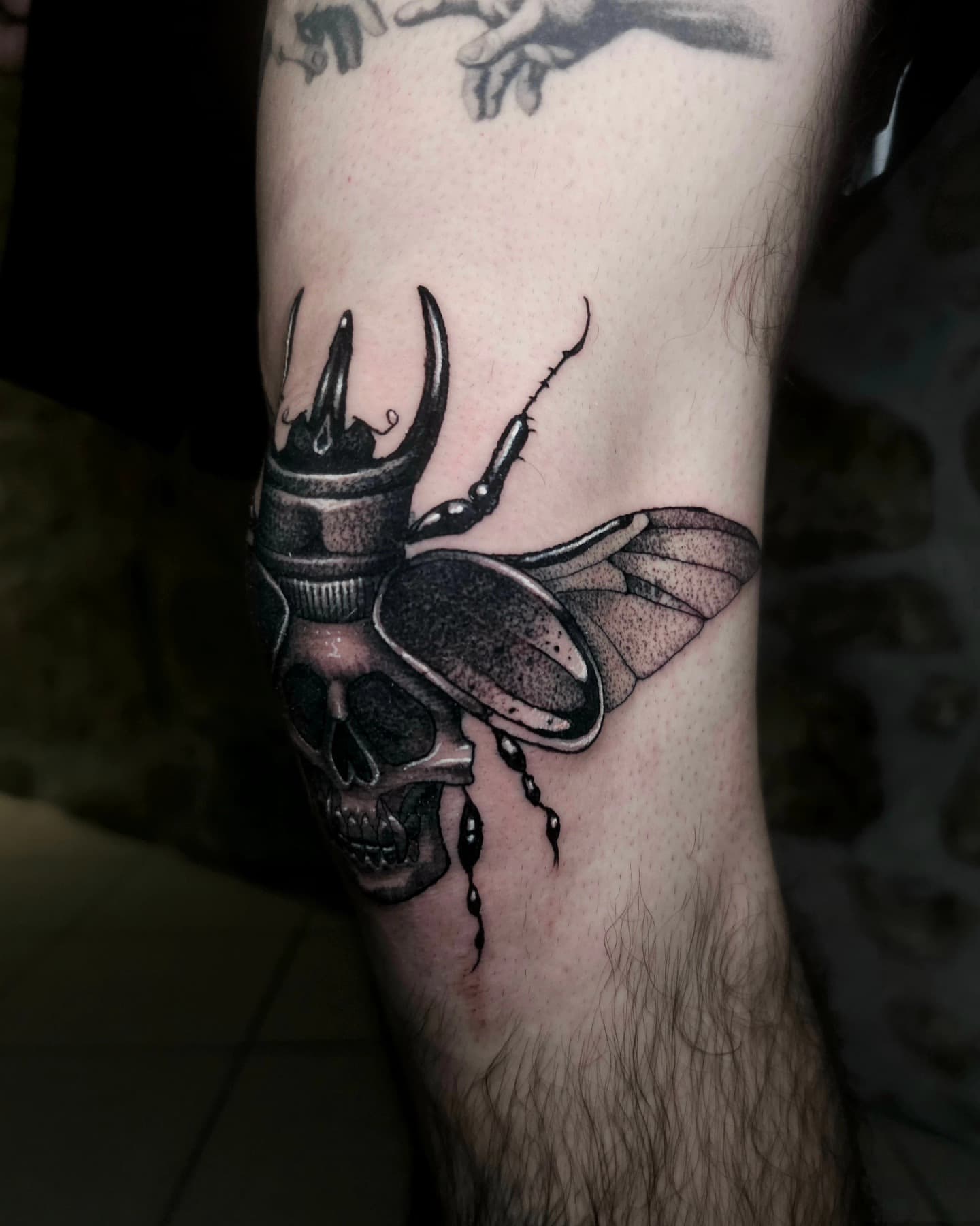 Beetle and skull dark art blackwork tattoo by Lex Almeida